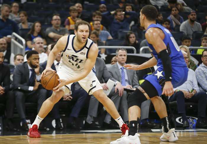 Bojan Bogdanovic (44) looks to make a play against Aaron Gordon (00) and the Orlando Magic.